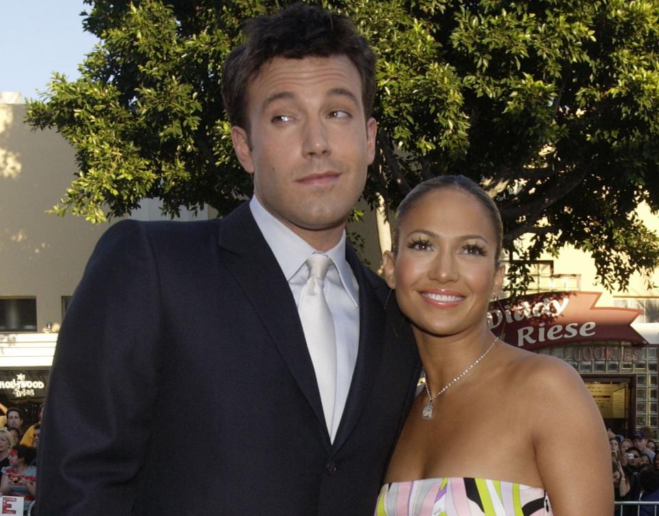 Ben and Jen pose together in an old photo from a red carpet