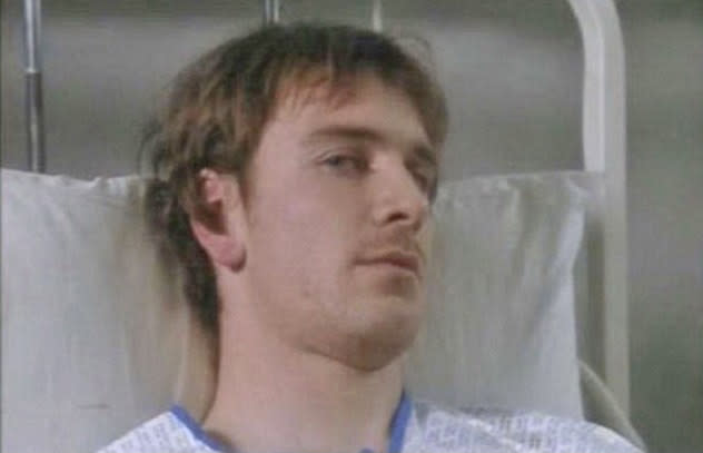 A young Michael Fassbender looks unrecognisable in this scene from Holby City shot in 2002. (BBC)