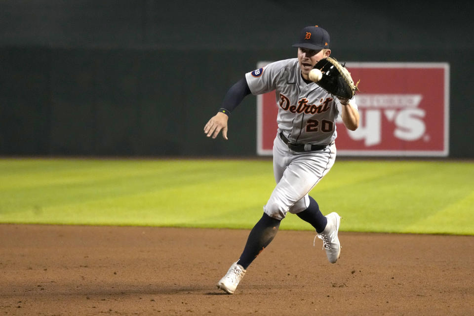 Detroit Tigers first baseman Spencer Torkelson fields a grounder by Arizona Diamondbacks' Josh Rojas, who was out at first during the sixth inning during a baseball game Friday, June 24, 2022, in Phoenix. (AP Photo/Rick Scuteri)