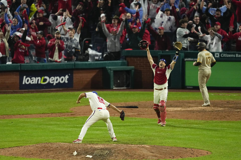 Philadelphia Phillies pitcher Ranger Suarez celebrates their win against the San Diego Padres in Game 5 of the baseball NL Championship Series between the San Diego Padres and the Philadelphia Phillies on Sunday, Oct. 23, 2022, in Philadelphia. (AP Photo/Matt Rourke)