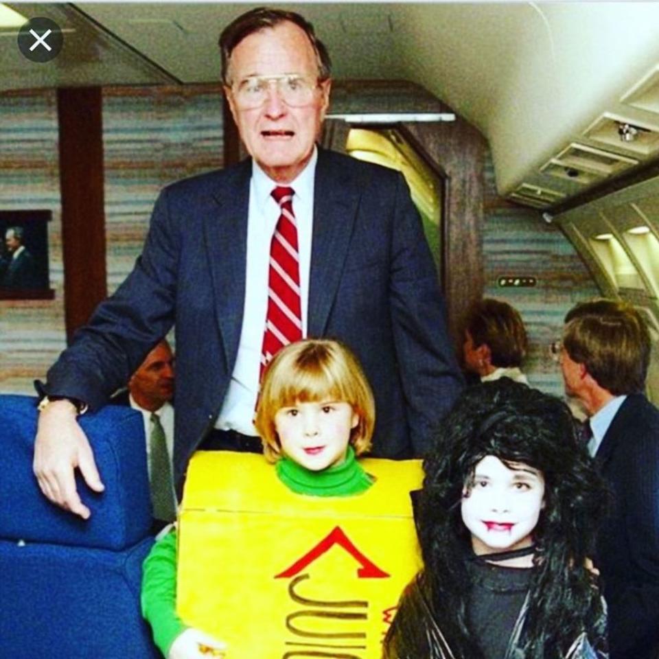 Jenna Bush Hager (front right) as a child with grandfather George H. W. Bush (back) and her twin sister Barbara Pierce Bush (right) on Halloween. | Jenna Bush Hager/Instagram