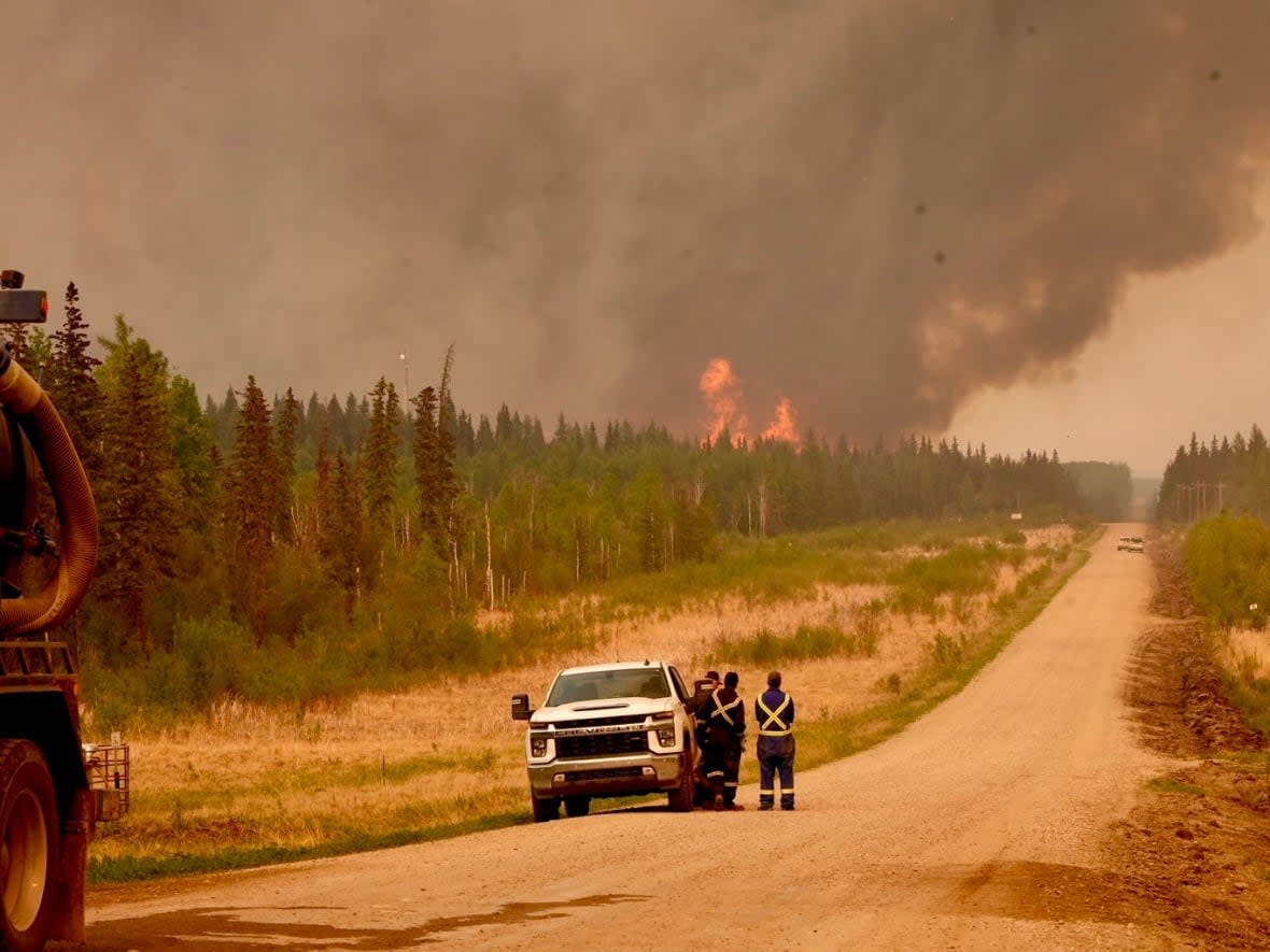 As of Thursday, there were 55 wildfires in the province's forest protections zones, with 14 still considered out of control. Climate change has often been tied into a conversation on economy amid the Alberta provincial election.  (Martin Trainor/CBC - image credit)