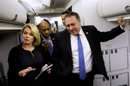 Spokesperson Heather Nauert (L) speaks as U.S. Secretary of State Mike Pompeo holds a dialogue with reporters in his plane while flying from Panama to Mexico, October 18, 2018. Brendan Smialowski/Pool via REUTERS/Files