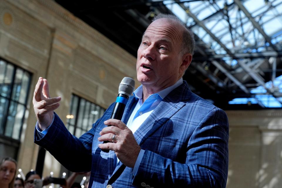 Detroit Mayor Mike Duggan talks with Ford Motor Co. employees gathered inside Michigan Central on their first day of work at the renovated train station, Tuesday, Oct. 8, 2024.