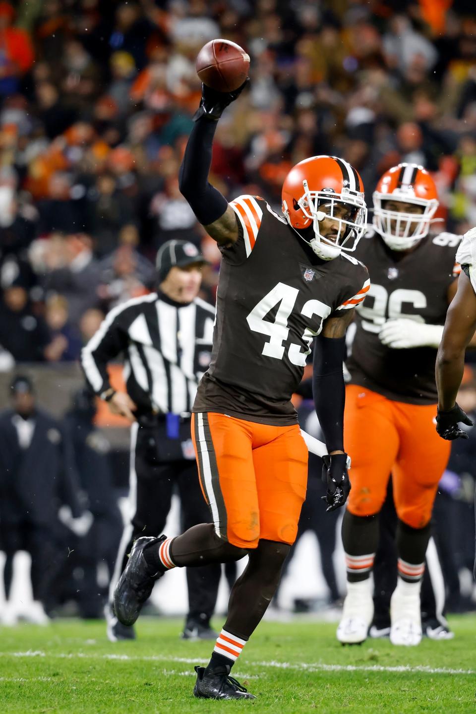 Cleveland Browns safety John Johnson III (43) reacts after recovering a fumble during an NFL football game against the Baltimore Ravens, Saturday, Dec. 17, 2022, in Cleveland. (AP Photo/Kirk Irwin)