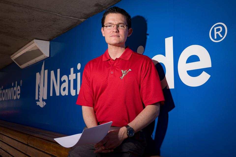 El Paso Chihuahuas broadcaster Tim Hagerty poses for a photos at the dugout at the Southwest University Park on Wednesday, March 29, 2023.