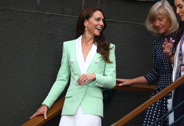 Catherine, Princess of Wales is accompanied by former players Debbie Jevans and Laura Robson as they walk through the grounds on day two of the Wimbledon Tennis Championships at All England Lawn Tennis and Croquet Club on July 4, 2023 in London [Photo by Hannah Mckay – Pool/Getty Images].