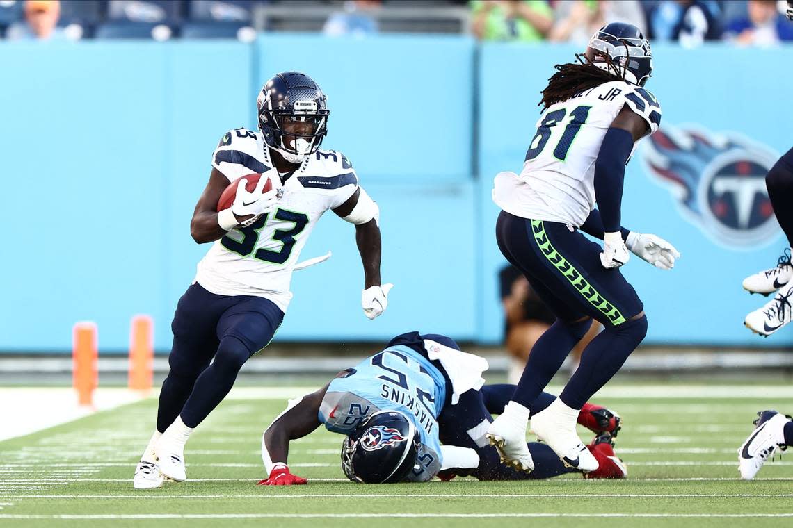 Seahawks returner Dee Williams (33) takes back the Tennessee Titans’ opening kickoff 41 yards down the sideline to begin an NFL preseason game at Nissan Stadium in Nashville Aug. 17, 2024. Casey Gower/USA Today Sports/USA TODAY NETWORK