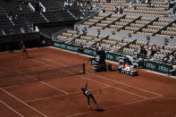 United States's Coco Gauff serves the ball to Czech Republic's Barbora Krejcikova during their quarterfinal match of the French Open tennis tournament at the Roland Garros stadium Wednesday, June 9, 2021 in Paris. (AP Photo/Thibault Camus)