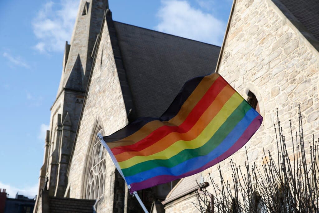 An LGBTQ+ flag flies over Union United Methodist Church in the South End of Boston. (Photo by Jessica Rinaldi/The Boston Globe via Getty Images)