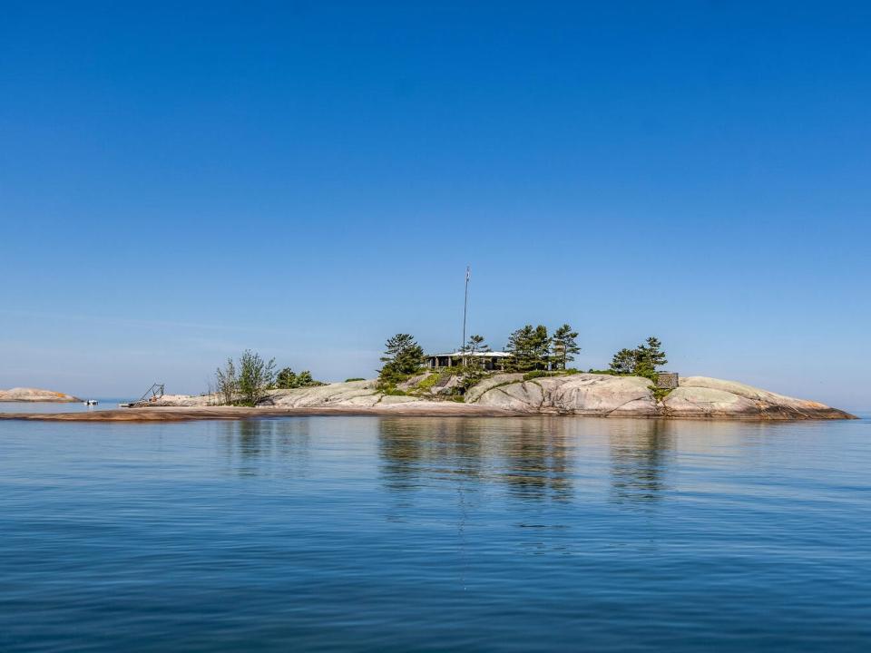 The circular house on Table Rock Islands as viewed from the ocean.