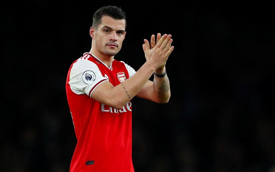  Arsenal's Granit Xhaka applauds fans - Reuters