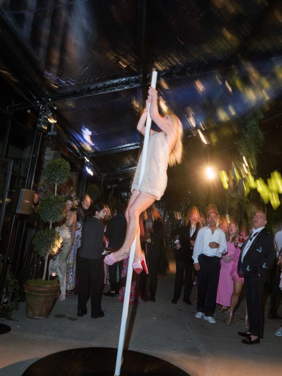 woman pole dancing