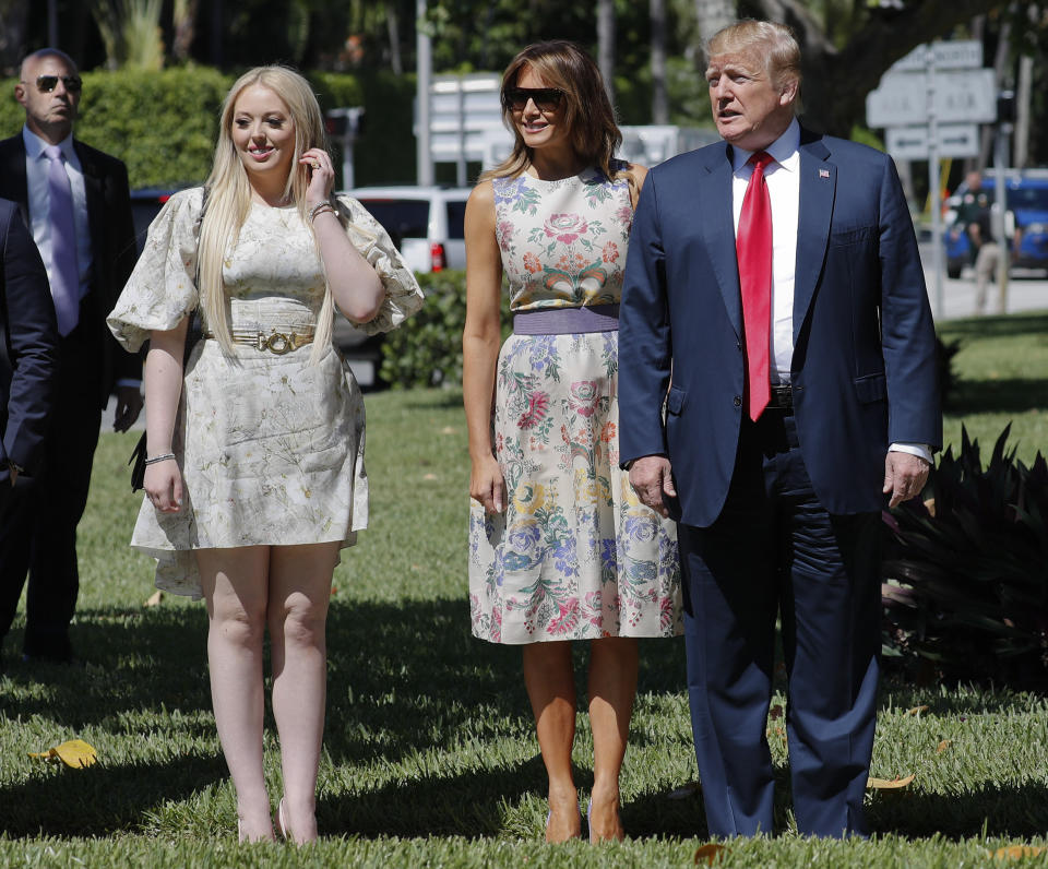 President Donald Trump, right, with first lady Melania Trump, center, and daughter Tiffany Trump, left, arrive for Easter services at Episcopal Church of Bethesda-by-the-Sea, Sunday, April 21, 2019, in Palm Beach, Fla. (AP Photo/Pablo Martinez Monsivais)