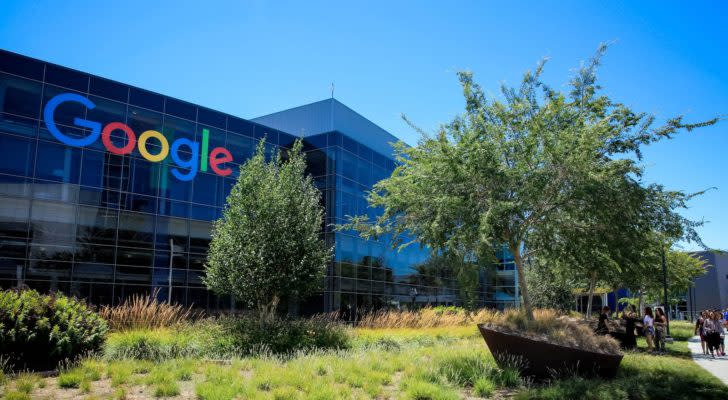 The Alphabet (GOOG GOOGL) logo on the side of a building.