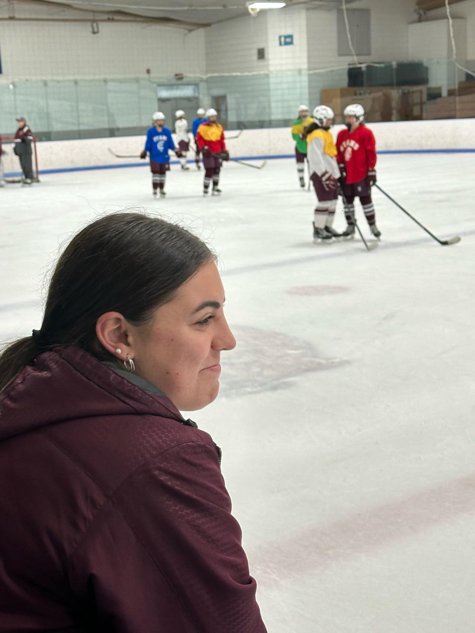 Durfee three-sport athlete and Bishop Stang ice hockey player Emily Curran watches a recent practice at Hetland Ice Arena.
