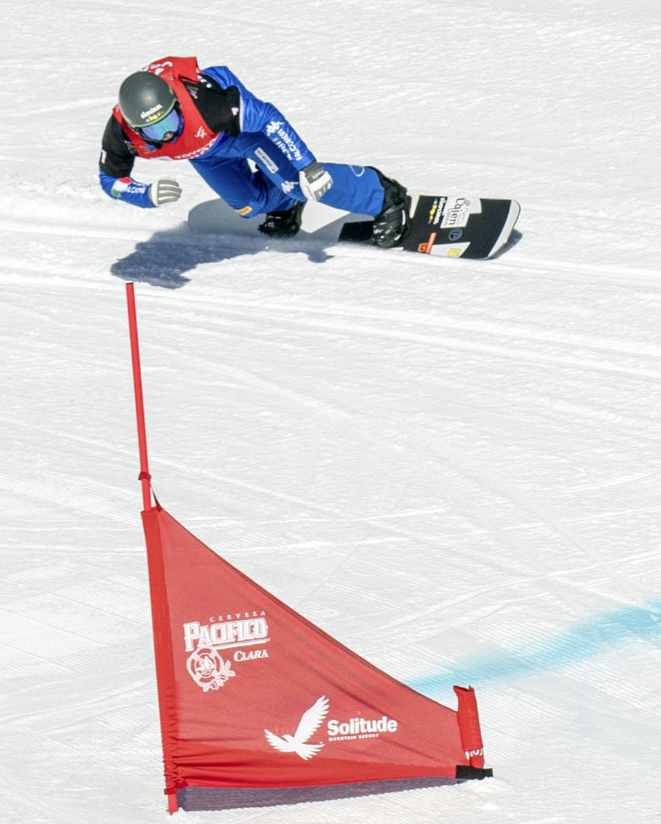 Emanuel Perathoner, of Italy, races into the first turn during the men's Snowboard Cross final at the Freestyle Ski and Snowboard World Championships, Friday, Feb. 1, 2019, in Solitude, Utah. Perathoner finished third. (AP Photo/Tyler Tate)