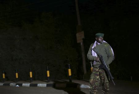 A Kenyan soldier holds his rifle near the Westgate shopping centre in Nairobi September 23, 2013. REUTERS/Karel Prinsloo