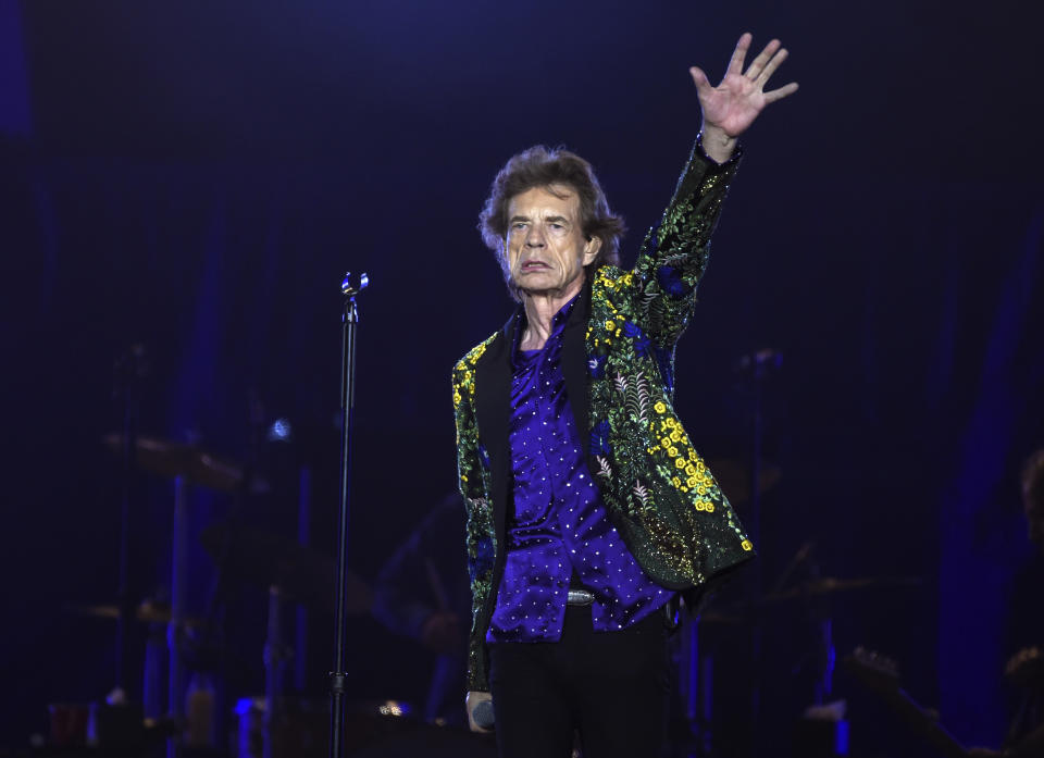 Mick Jagger of the Rolling Stones waves to the crowd during the group's concert at the Rose Bowl, Thursday, Aug. 22, 2019, in Pasadena, Calif. (Photo by Chris Pizzello/Invision/AP)