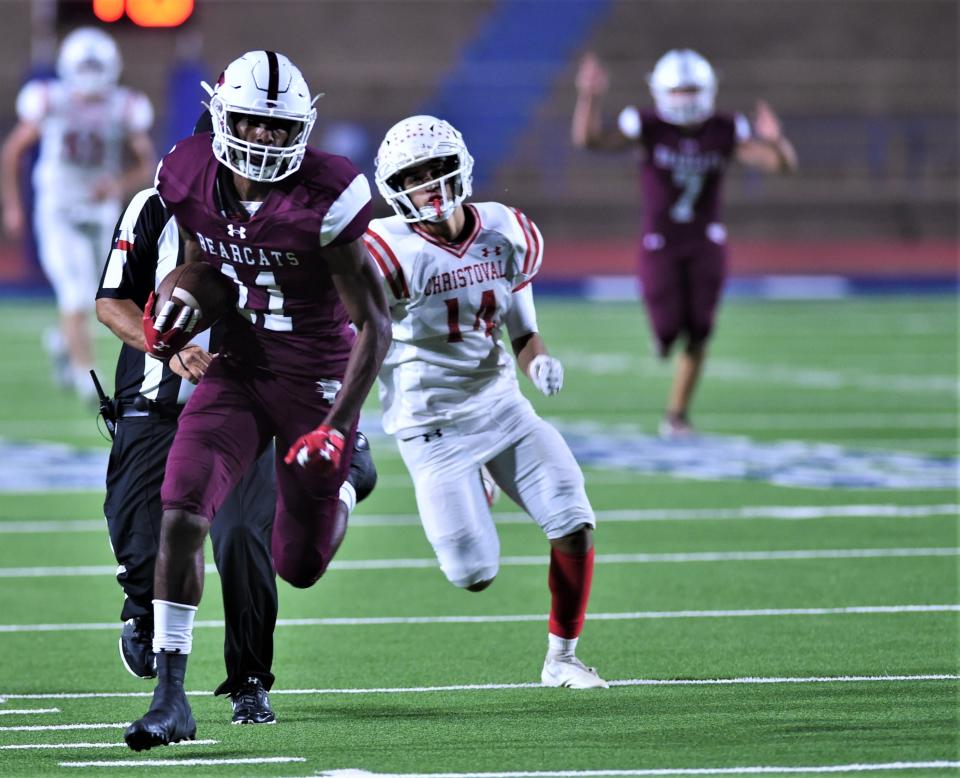 Hawley receiver Diontay Ramon, left runs for a 63-yard TD catch as Christoval's Tristen Alvarado gives chase. The TD pass from Rodey Hooper gave the Bearcats a 14-0 lead 5:50 into the game. Hawley won the Region I-2A Division I bi-district playoff game 52-8 last week in San Angelo.