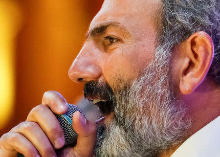 Armenian opposition leader Nikol Pashinyan addresses supporters during a rally after his bid to be interim prime minister was blocked by the parliament in Yerevan, Armenia May 1, 2018. REUTERS/Gleb Garanich