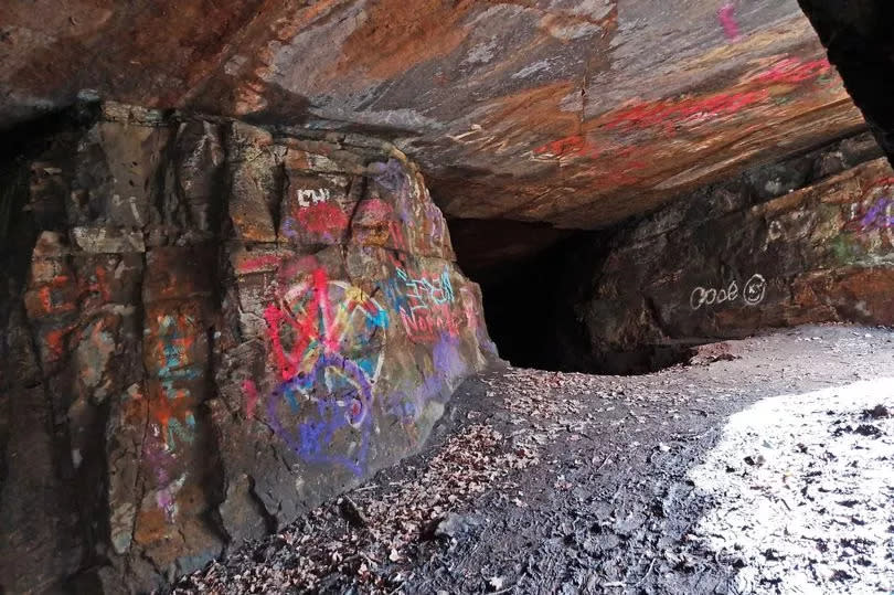 Graffiti now defaces part of the caverns, which a number of people have had to be rescued from over the years