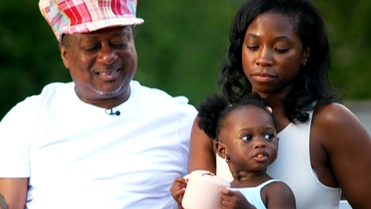 Kermit Ruffins, his girlfriend, Harmonese Pleasant, and their daughter, Blossom, speak to 