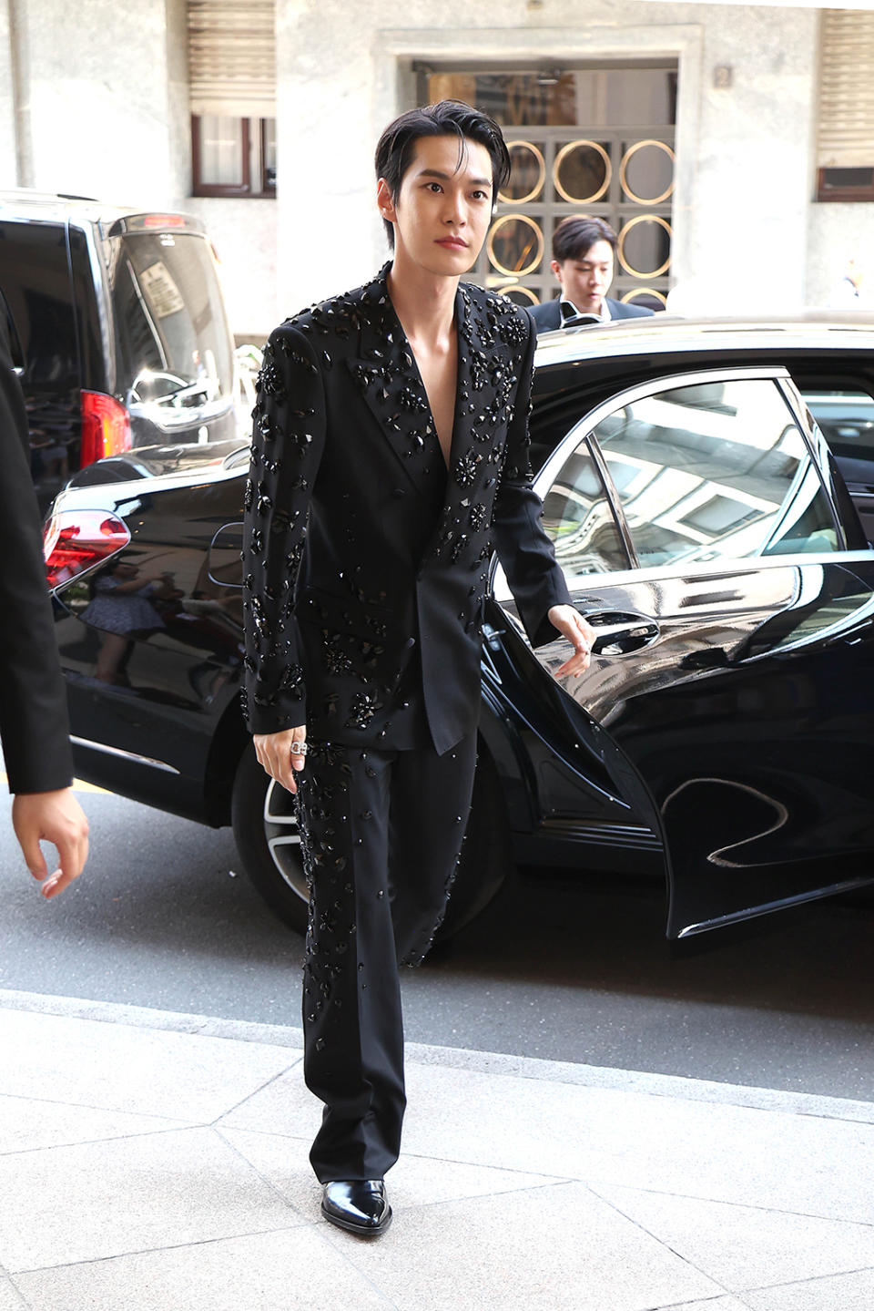 Doyoung is seen attending Dolce & Gabbana's menswear spring 2024 show during the Milan fashion week on June 17, 2023 in Milan.