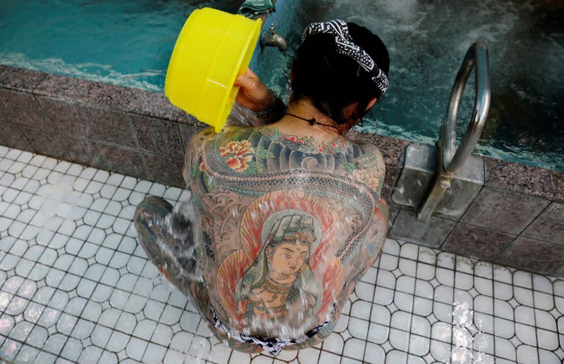 The Wider Image: Breaking taboos: Japan's tattoo fans bare their ink