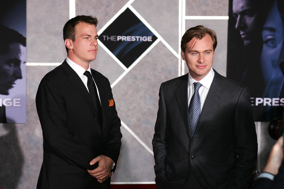 Los Angeles, UNITED STATES:  Writer Jonathan Nolan (L) and director Christopher Nolan (R) pose for photos on the red carpet at the world premier of 