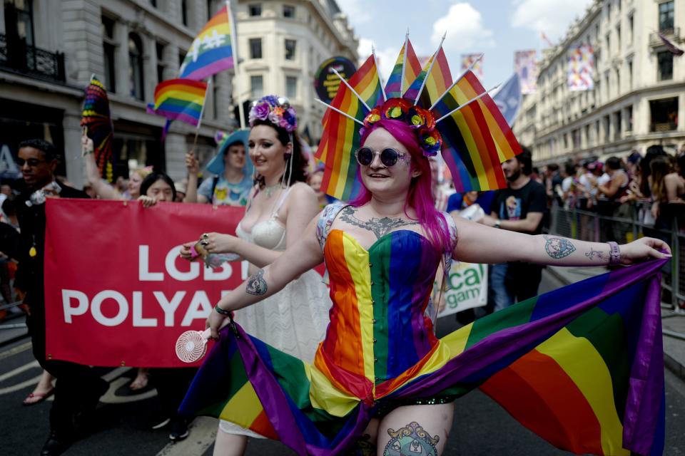 Members of the Lesbian, Gay, Bisexual and Transgender (LGBT) community take part in the annual Pride Parade in London on July 7, 2018. (Photo by Tolga AKMEN / AFP)        (Photo credit should read TOLGA AKMEN/AFP/Getty Images)