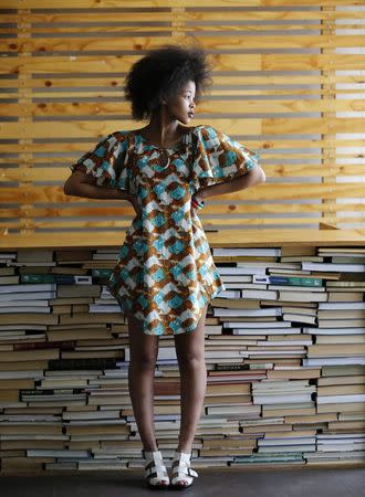 South African model Lulama Mlambo poses while wearing clothes made by Kisua.com, an online clothing retailer launched by Ghanaian entrepreneur Samuel Mensah, in Johannesburg, February 2, 2015. REUTERS/Siphiwe Sibeko