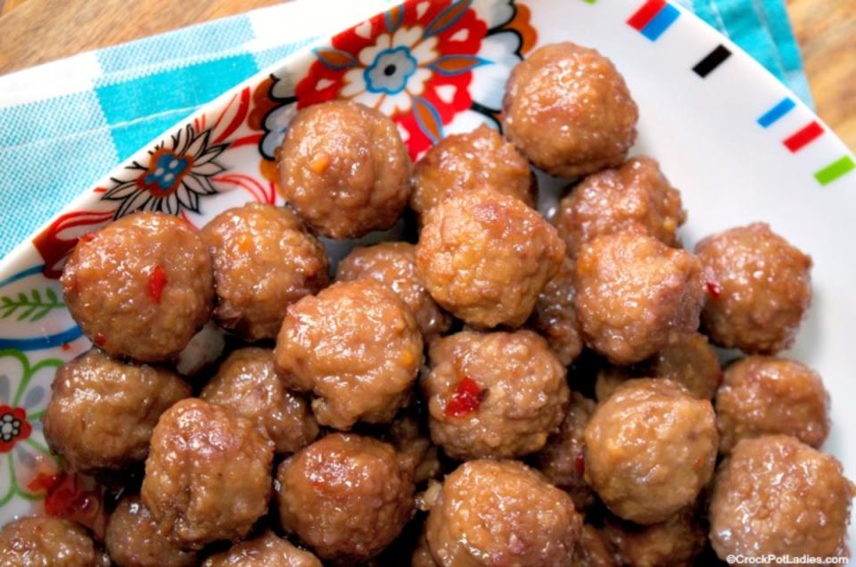 <p>Crock Pot Ladies</p><p>Chili sauce gives these meatballs just a little kick.</p><p><strong>Get the recipe: <a href="https://crockpotladies.com/crockpot-party-meatballs/" rel="nofollow noopener" target="_blank" data-ylk="slk:Crock Pot Party Meatballs;elm:context_link;itc:0;sec:content-canvas" class="link ">Crock Pot Party Meatballs</a></strong></p>