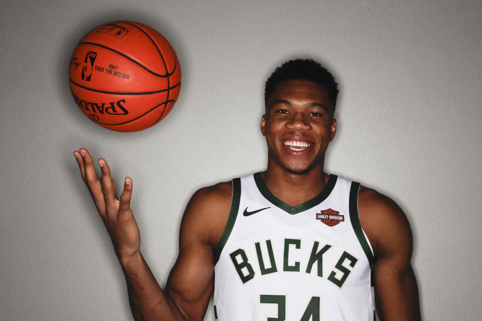 Milwaukee Bucks' Giannis Antetokounmpo poses for a photograph during media day at the NBA basketball team's new arena Monday, Sept. 24, 2018, in Milwaukee. (AP Photo/Morry Gash)