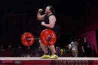 Laurel Hubbard of New Zealand reacts after a lift in the women's +87kg weightlifting event at the 2020 Summer Olympics, Monday, Aug. 2, 2021, in Tokyo, Japan. (AP Photo/Seth Wenig)