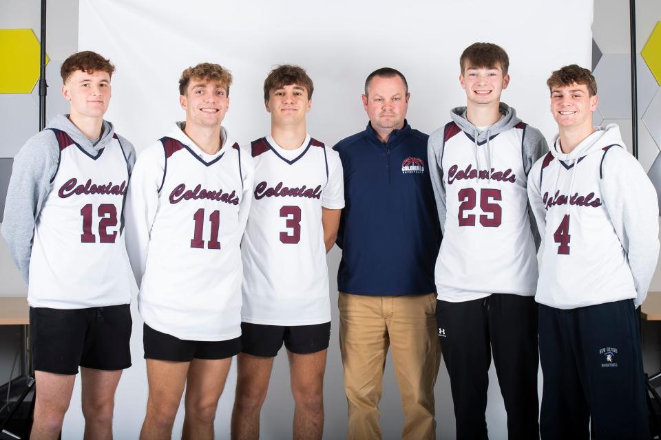 New Oxford basketball head coach Nathan Myers poses for a photo with senior players (from left) Jake Lawrence, Derek Christner, Emrah Karic, Jackson Wolfe and Ryan Carver during YAIAA winter sports media days Thursday, November 9, 2023, in York.