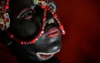 <p>A reveller from Salgueiro performs during the second night of the Carnival parade at the Sambadrome in Rio de Janeiro, Brazil, Feb. 13, 2018. (Photo: Ricardo Moraes/Reuters) </p>