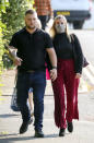 Teacher Kandice Barber, 35, arrives with her husband Daniel at Aylesbury Crown Court, Buckinghamshire, where she is appearing accused of engaging in illegal sexual activity with a 15-year-old boy.