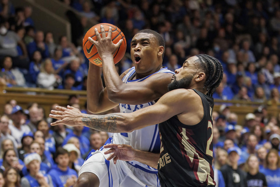 Duke's Jaylen Blakes, left, drives against Florida State's Darin Green, right, during the second half of an NCAA college basketball game in Durham, N.C., Saturday, Dec. 31, 2022. (AP Photo/Ben McKeown)