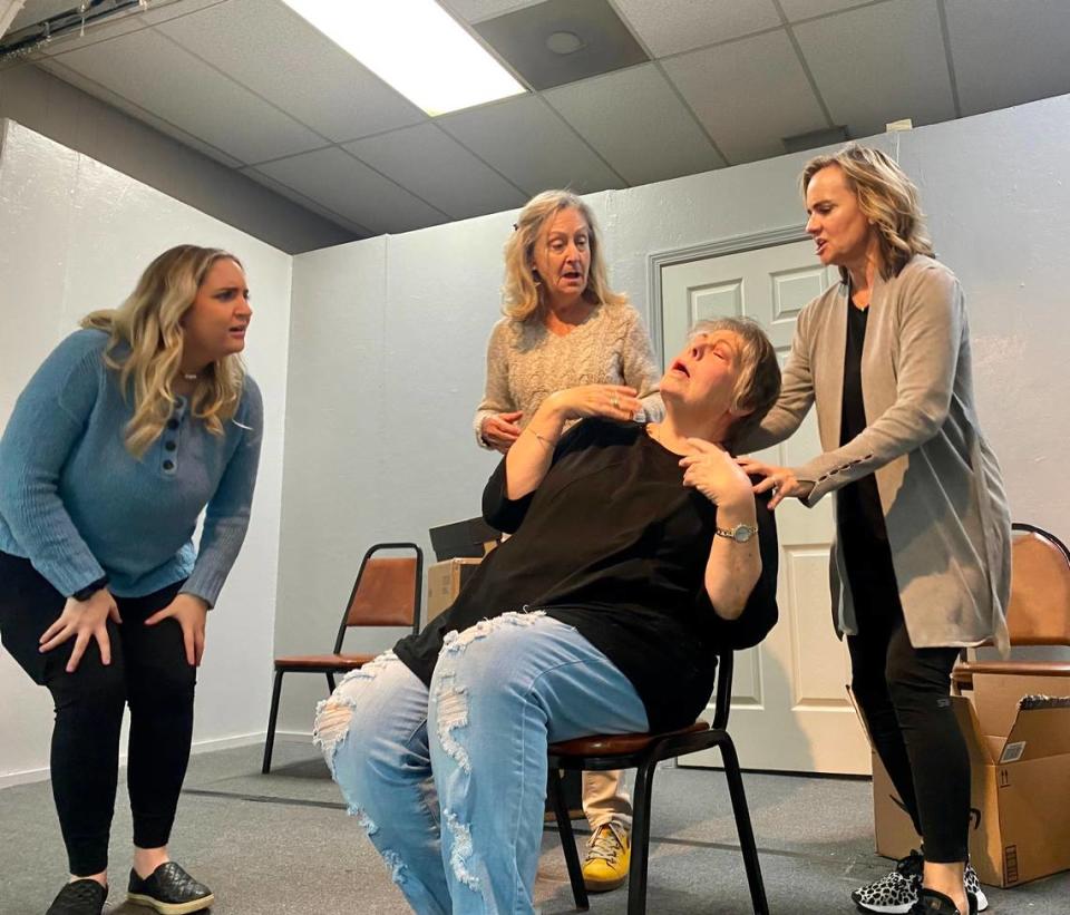 The cast of “Curtains Up!” hold rehearsal Monday at the Open Curtain Theater, located at the Moose Lodge on Burcale Road. Photo from March 13, 2023.