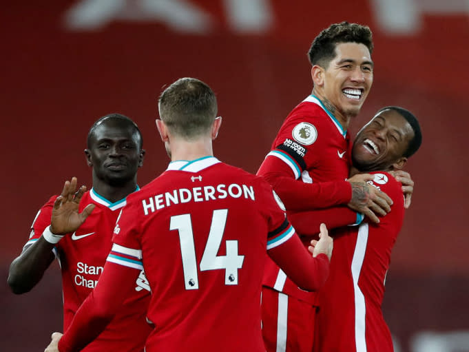 Liverpool celebrate scoring a goal (Getty Images)