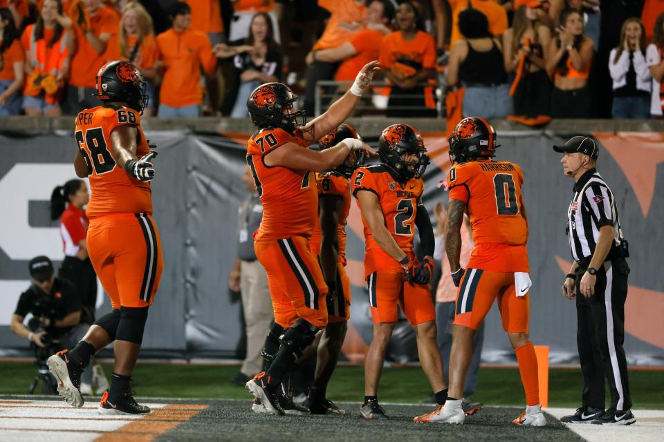 Oregon State Beavers wide receiver Anthony Gould (2) celebrates with teammates after scoring a touchdown during the second half against the Washington State Cougars at Reser Stadium Oct. 15, 2022, in Corvallis.