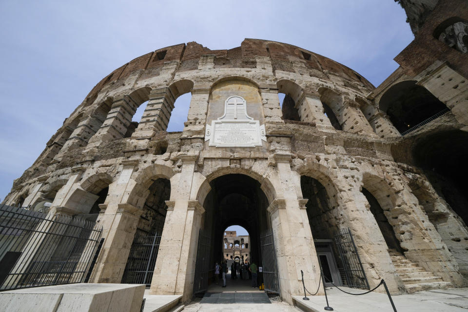 A view of the ancient Colosseum, in Rome, Friday, June 25, 2021. After 2-and-1/2 years of work to shore up the Colosseum’s underground passages, tourists will be able to go down and wander through part of what what had been the ancient arena’s “backstage.” (AP Photo/Andrew Medichini)