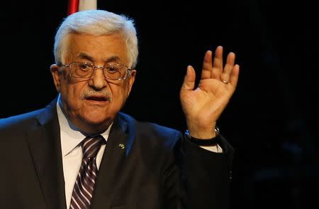 Palestinian President Mahmoud Abbas gestures as he speaks during a conference in the West Bank city of Ramallah June 19, 2014. REUTERS/Mohamad Torokman