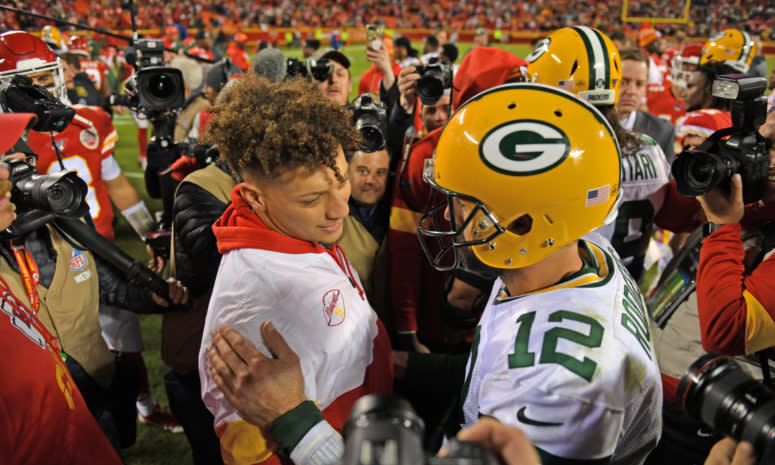 Patrick Mahomes and Aaron Rodgers meet on the field.