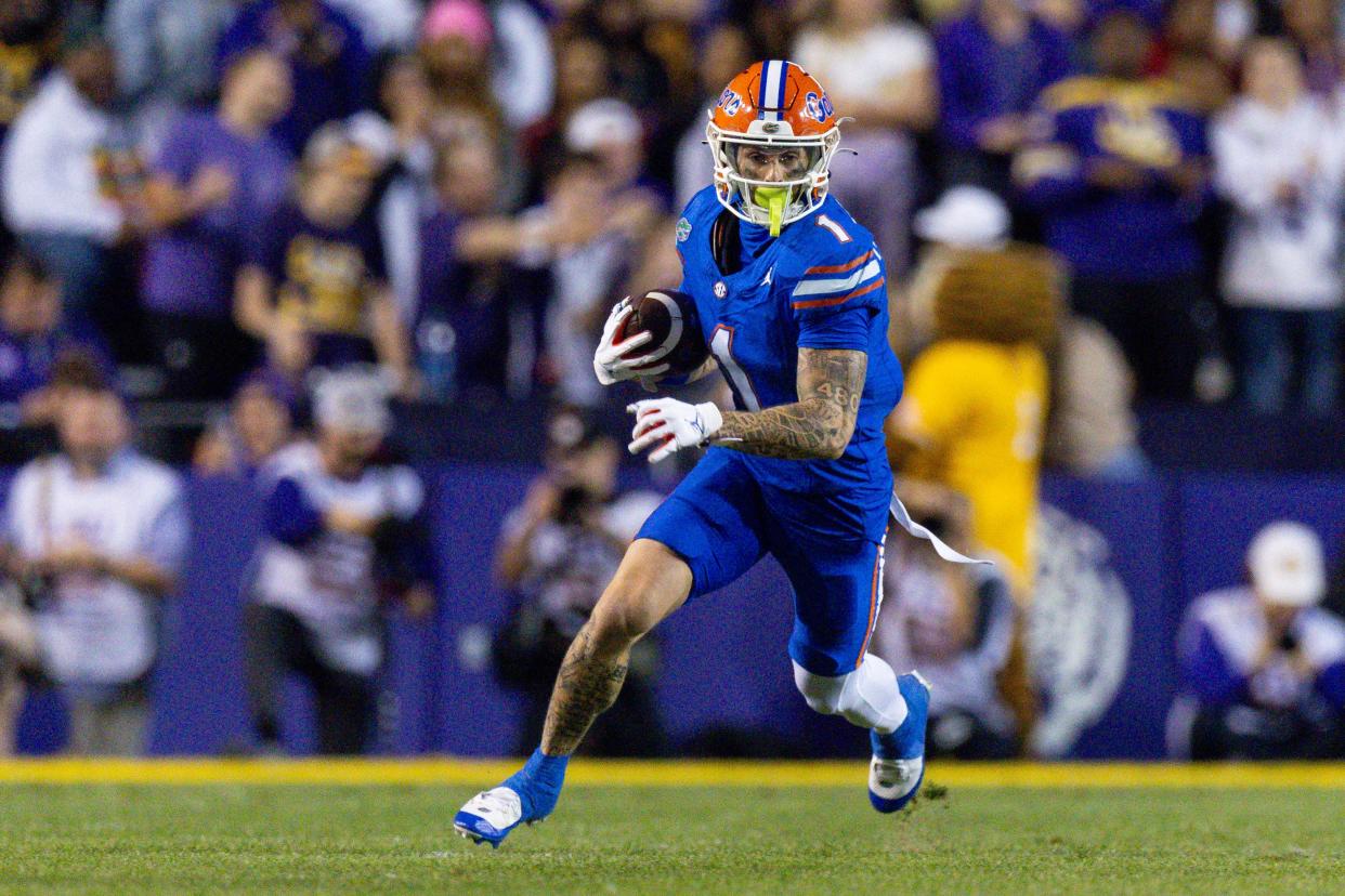 Nov 11, 2023; Baton Rouge, Louisiana, USA; Florida Gators wide receiver Ricky Pearsall (1) catches a pass against the LSU Tigers during the first half at Tiger Stadium. Mandatory Credit: Stephen Lew-USA TODAY Sports