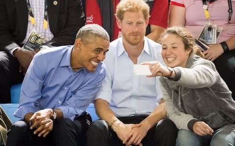  A young fan takes a selfie with the friends at the Invictus Games - Credit: Samir Hussein/WireImage