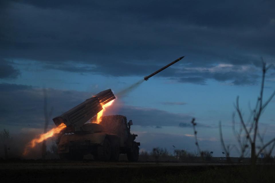 A BM-21 Grad multiple rocket launcher fires towards Russian positions on the frontline near Bakhmut, Donetsk region, on 23 April 2023, amid the Russian invasion on Ukraine (AFP via Getty Images)