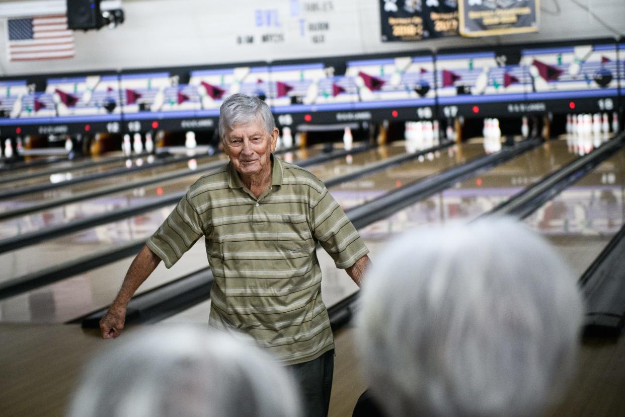 Doug Hepner, 94, celebrates after getting a strike during league play at B&B Bowling Lanes in Fayetteville on Tuesday, May 1, 2024.