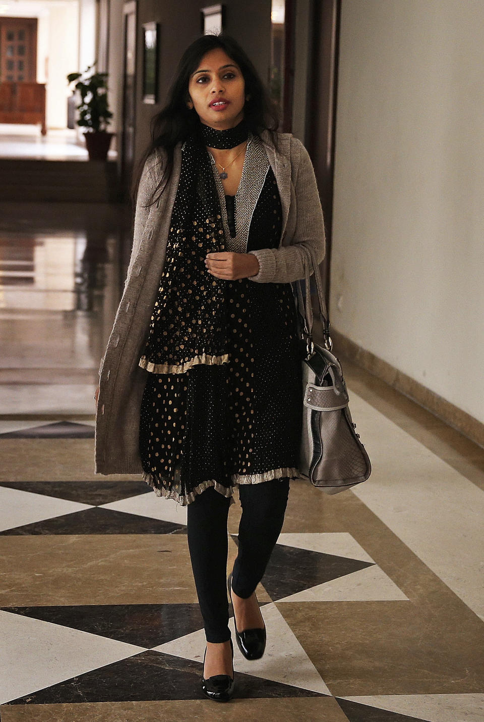Devyani Khobragade, who served as India’s deputy consul general in New York, leaves Maharastra Sadan state house in New Delhi, India, Saturday, Jan. 11, 2014. Khobragade, 39, is accused of exploiting her Indian-born housekeeper and nanny, allegedly having her work more than 100 hours a week for low pay and lying about it on a visa form. Khobragade has maintained her innocence, and Indian officials have described her treatment as barbaric. (AP Photo/Saurabh Das)